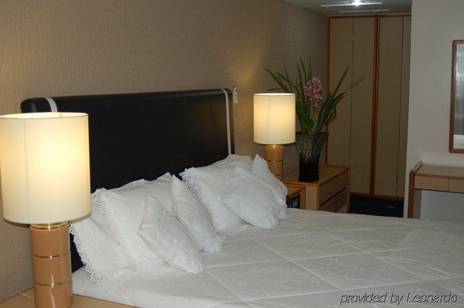Like Ue Hotel Гоянія Номер фото